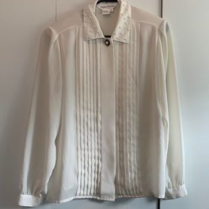 Vintage cream colored blouse with pearl accents.